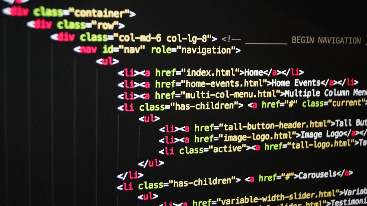 Website code displayed on a monitor